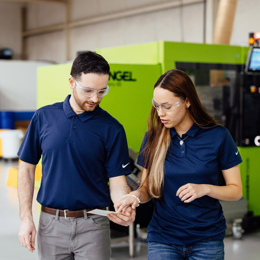 manufacturing employees collaborating